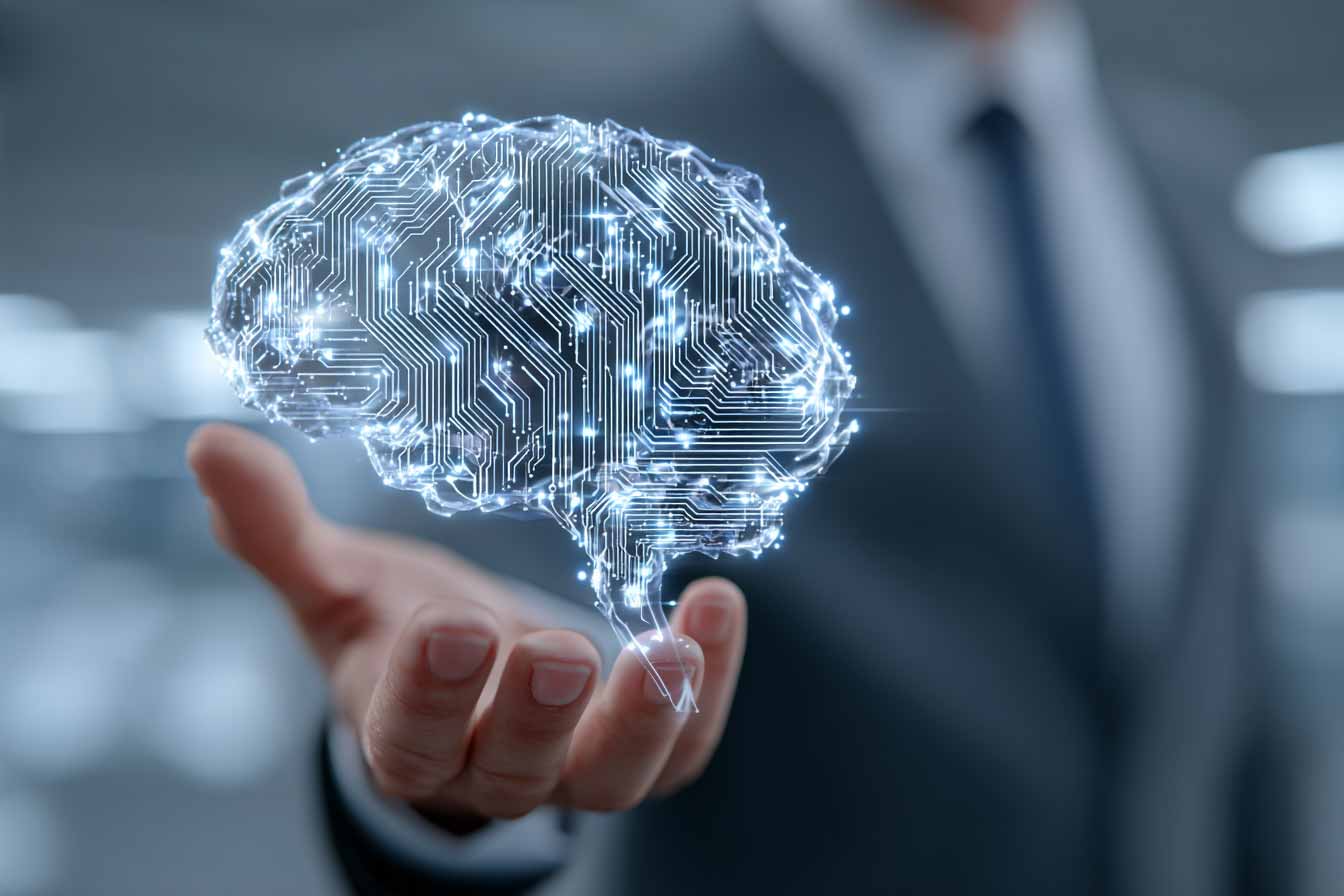 Studenten arbeiten gemeinsam an Spieleentwicklungsprojekten an Computern in modernem Lernumfeld